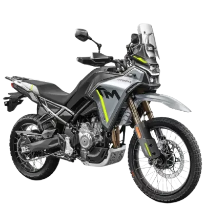 A nimble CFMOTO 450MT lightweight adventure motorcycle with rally styling, ready for off-road rental tours in Andalusia | Una ágil moto trail ligera CFMOTO 450MT con estilo rally, lista para rutas de alquiler off-road en Andalucía.
